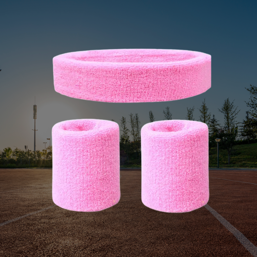 A Sportiq DripFlex Headband Set in Bright Blush Pink, made from a polyester cotton blend with medium to high level elasticity and machine washable (cold), displayed on a grass background.