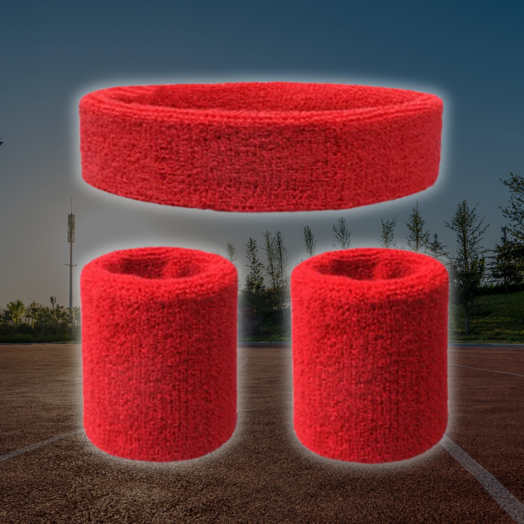 A Sportiq DripFlex Headband Set in Flame Red, made from a polyester cotton blend with medium to high level elasticity and machine washable (cold), displayed on a grass background.
