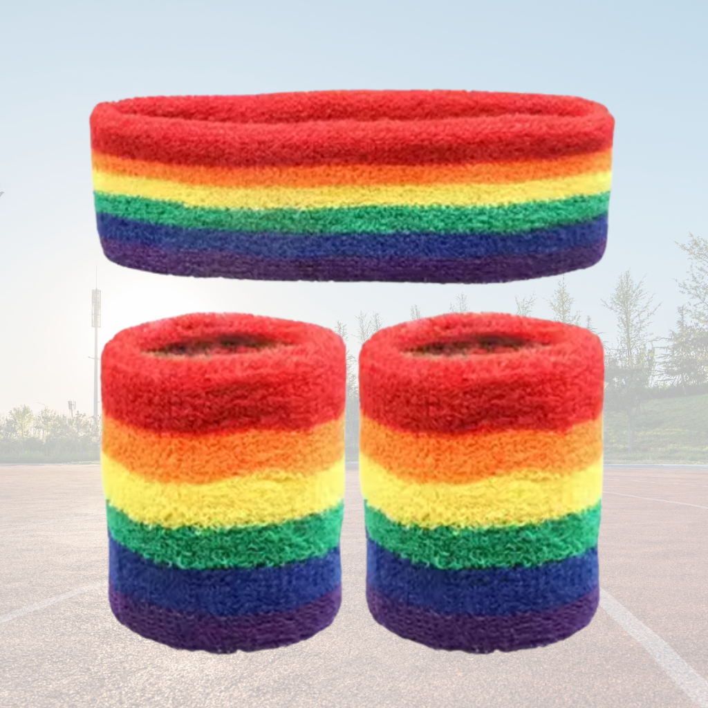 A Sportiq DripFlex Headband Set in Flux Rainbow, made from a polyester cotton blend with medium to high level elasticity and machine washable (cold), displayed on a grass background.