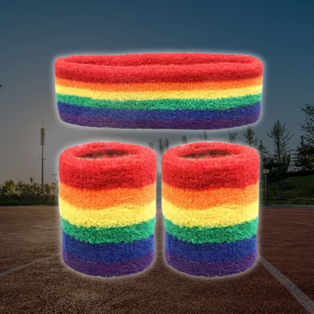A Sportiq DripFlex Headband Set in Flux Rainbow, made from a polyester cotton blend with medium to high level elasticity and machine washable (cold), displayed on a grass background.