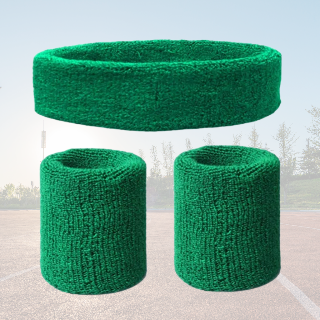 A Sportiq DripFlex Headband Set in Forrest Green, made from a polyester cotton blend with medium to high level elasticity and machine washable (cold), displayed on a grass background.