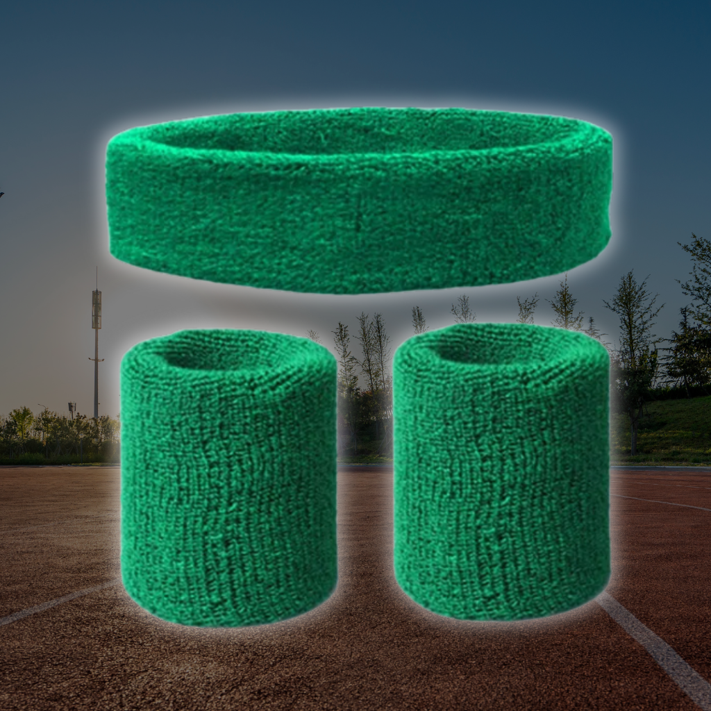 A Sportiq DripFlex Headband Set in Forrest Green, made from a polyester cotton blend with medium to high level elasticity and machine washable (cold), displayed on a grass background.