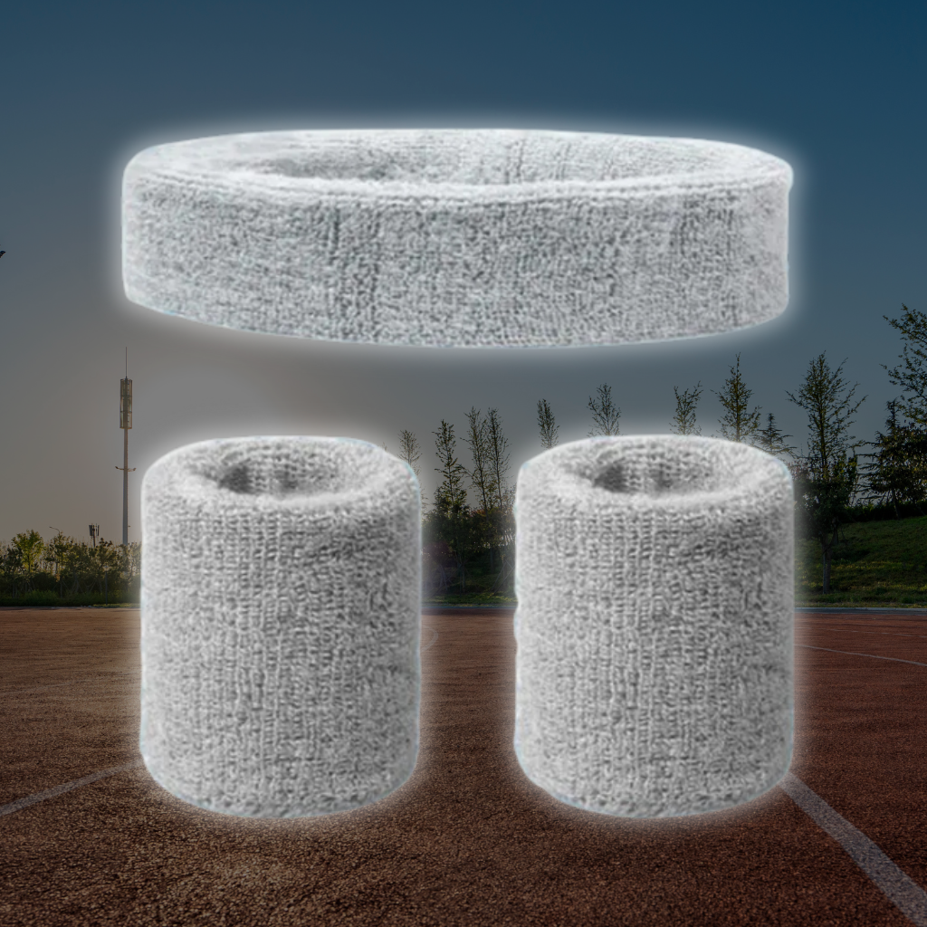 A Sportiq DripFlex Headband Set in Gray Steel, made from a polyester cotton blend with medium to high level elasticity and machine washable (cold), displayed on a grass background.