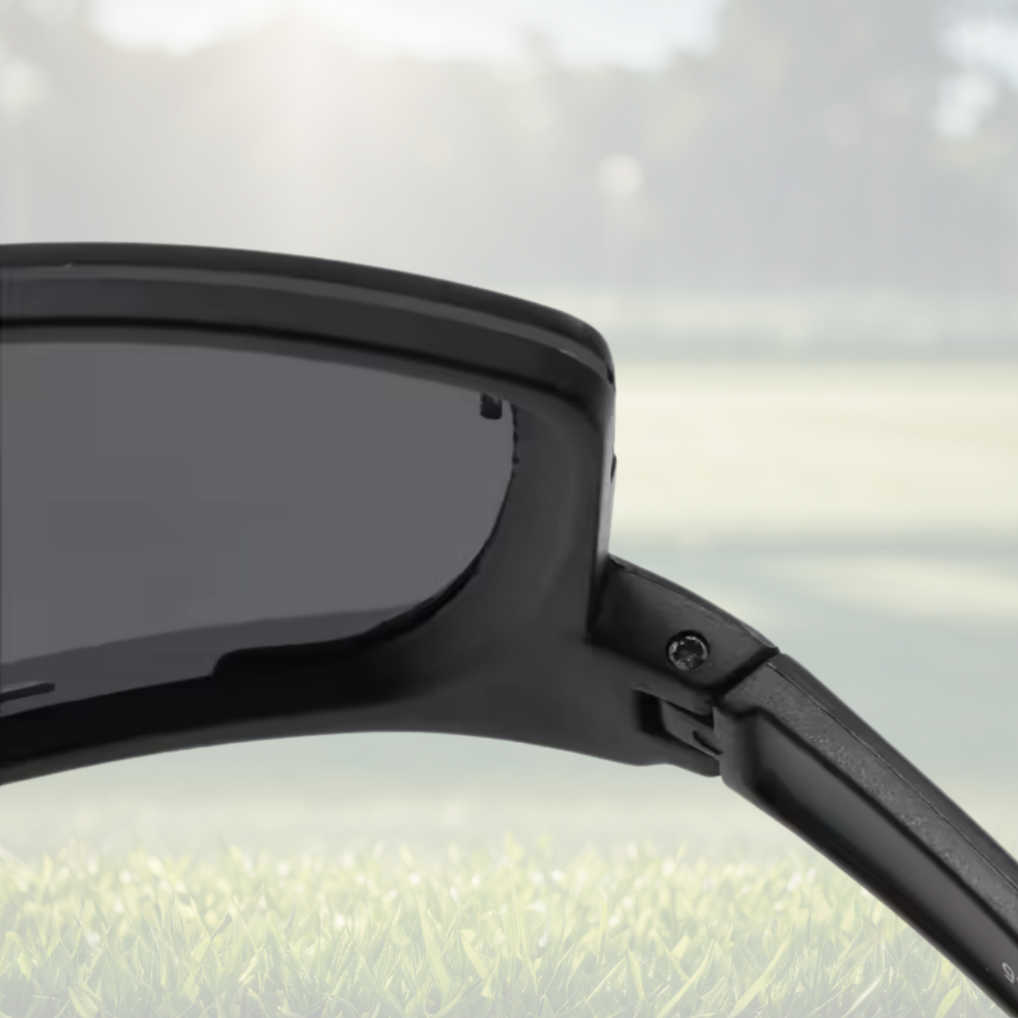 A pair of Sportiq Horizon Tidal performance sunglasses with blue reflective lenses and blue frame, UV400, polycarbonate frame with polycarbonate lens, displayed on a grass background.