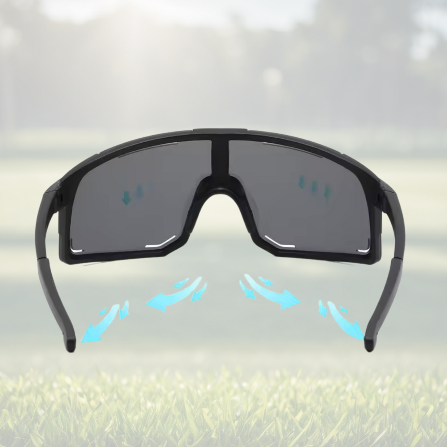 A pair of Sportiq Horizon Tidal performance sunglasses with blue reflective lenses and blue frame, UV400, polycarbonate frame with polycarbonate lens, displayed on a grass background.