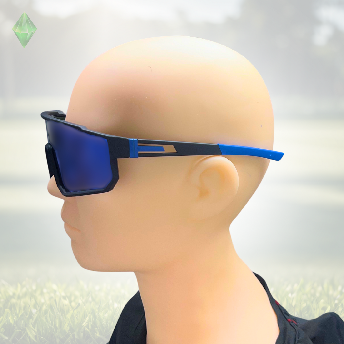 A pair of Sportiq VividShield sunglasses with blue reflective lenses and a black frame, polarized UV400, polycarbonate frame with TAC lens, displayed on a grass background.