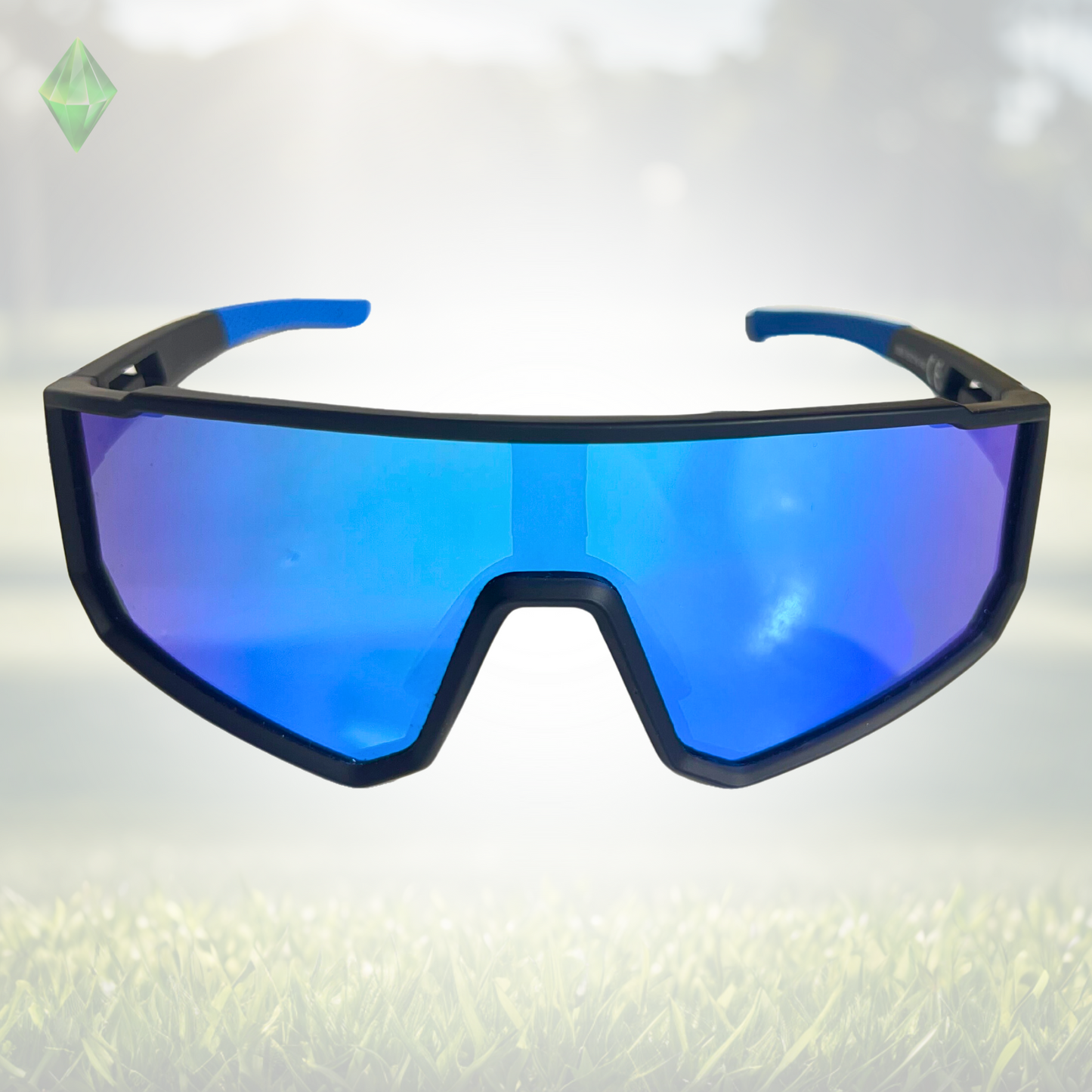 A pair of Sportiq VividShield sunglasses with blue reflective lenses and a black frame, polarized UV400, polycarbonate frame with TAC lens, displayed on a grass background.