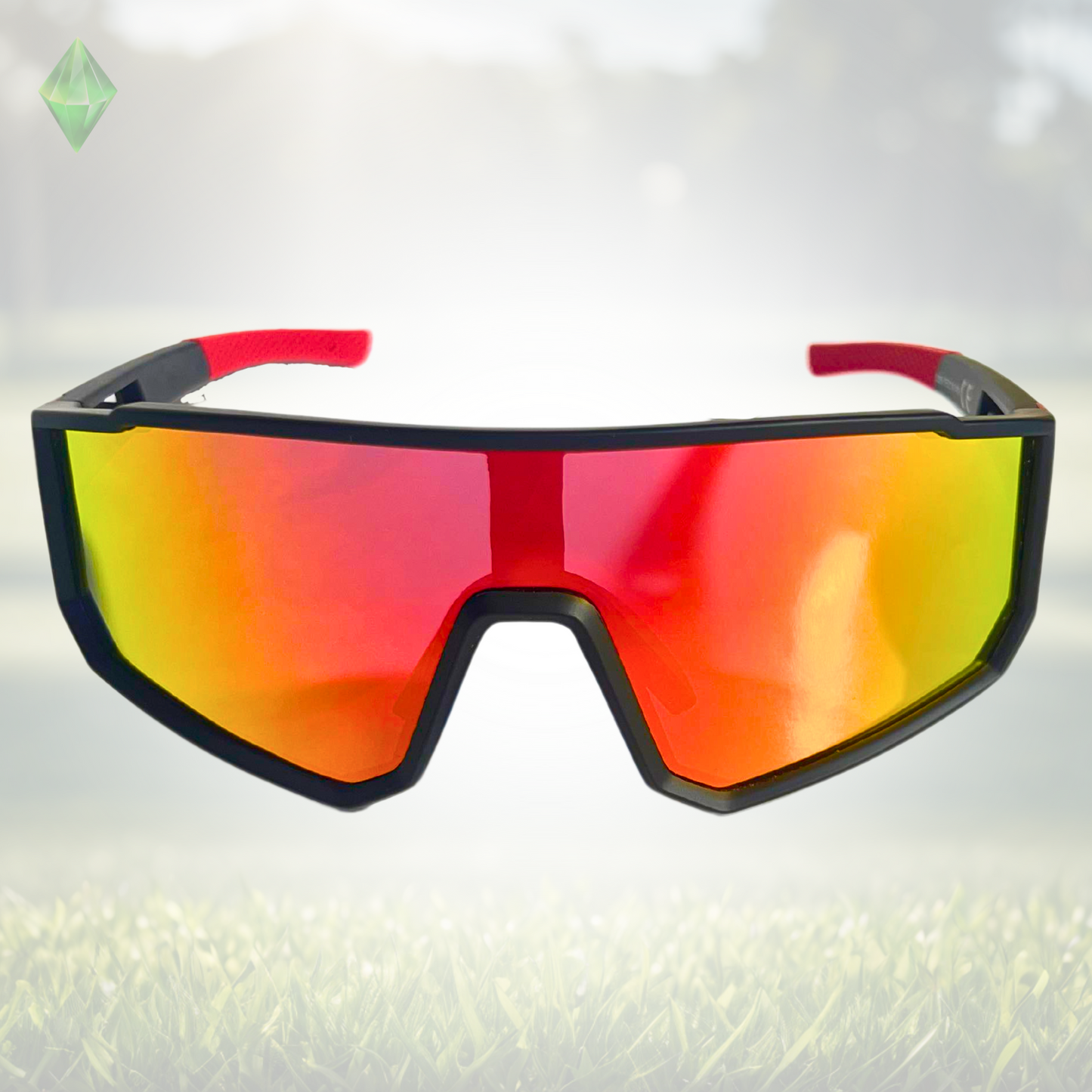 A pair of Sportiq VividShield sunglasses with black and red frame and red reflective lens, polarized UV400, polycarbonate frame with TAC lens, displayed on a grass background.