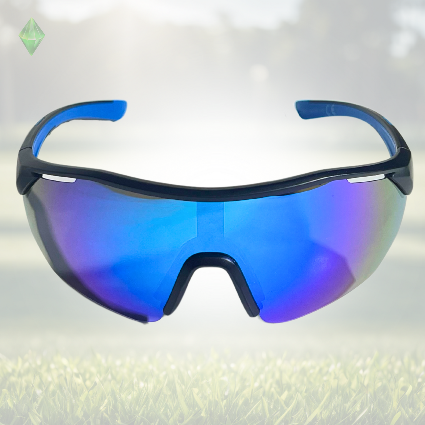 A pair of Sportiq ClarityX - Azure professional sport sunglasses with blue reflective lenses and black frame, polarized UV400, polycarbonate frame with TAC lens, displayed on a grass background.