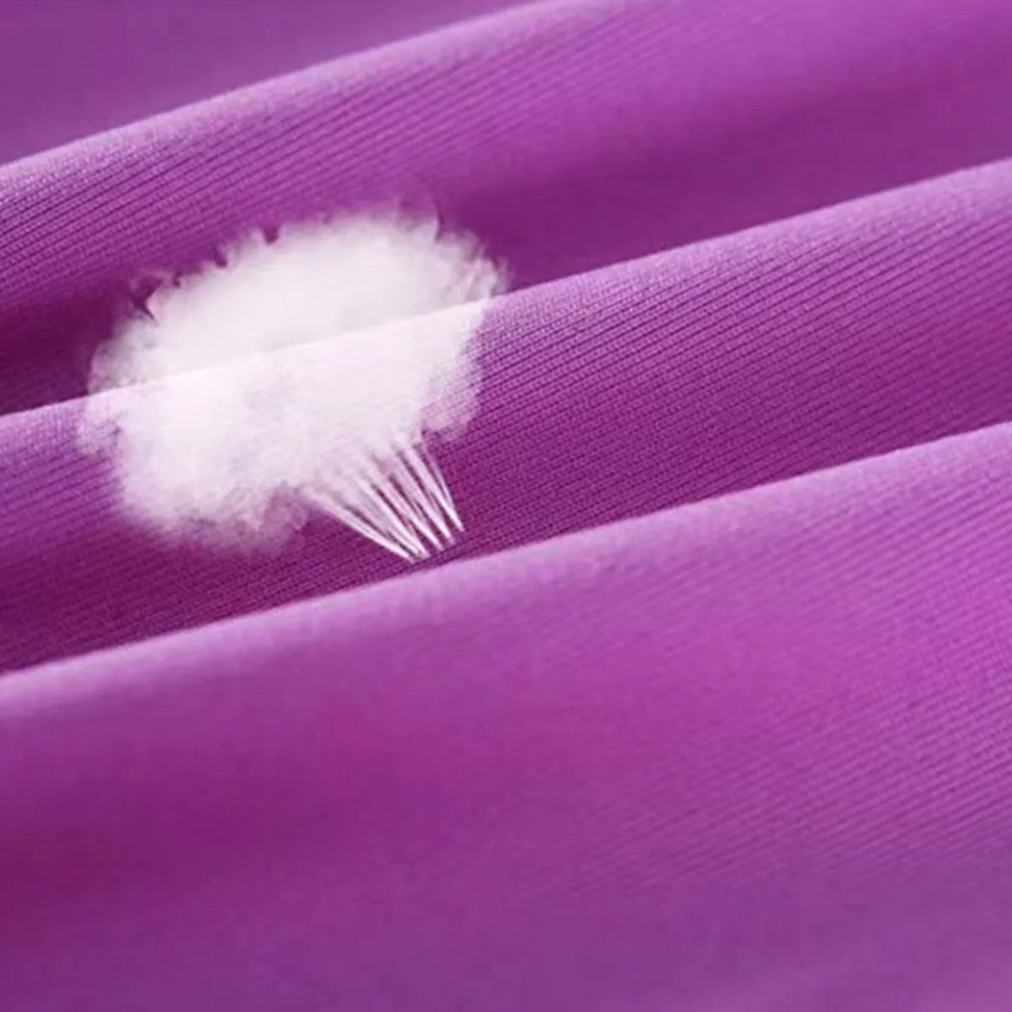 A pair of Sportiq Swift Sleeves, flexible and stretchy made of breathable polyester with a cooling and sun blocking affect, displayed on a grass background.
