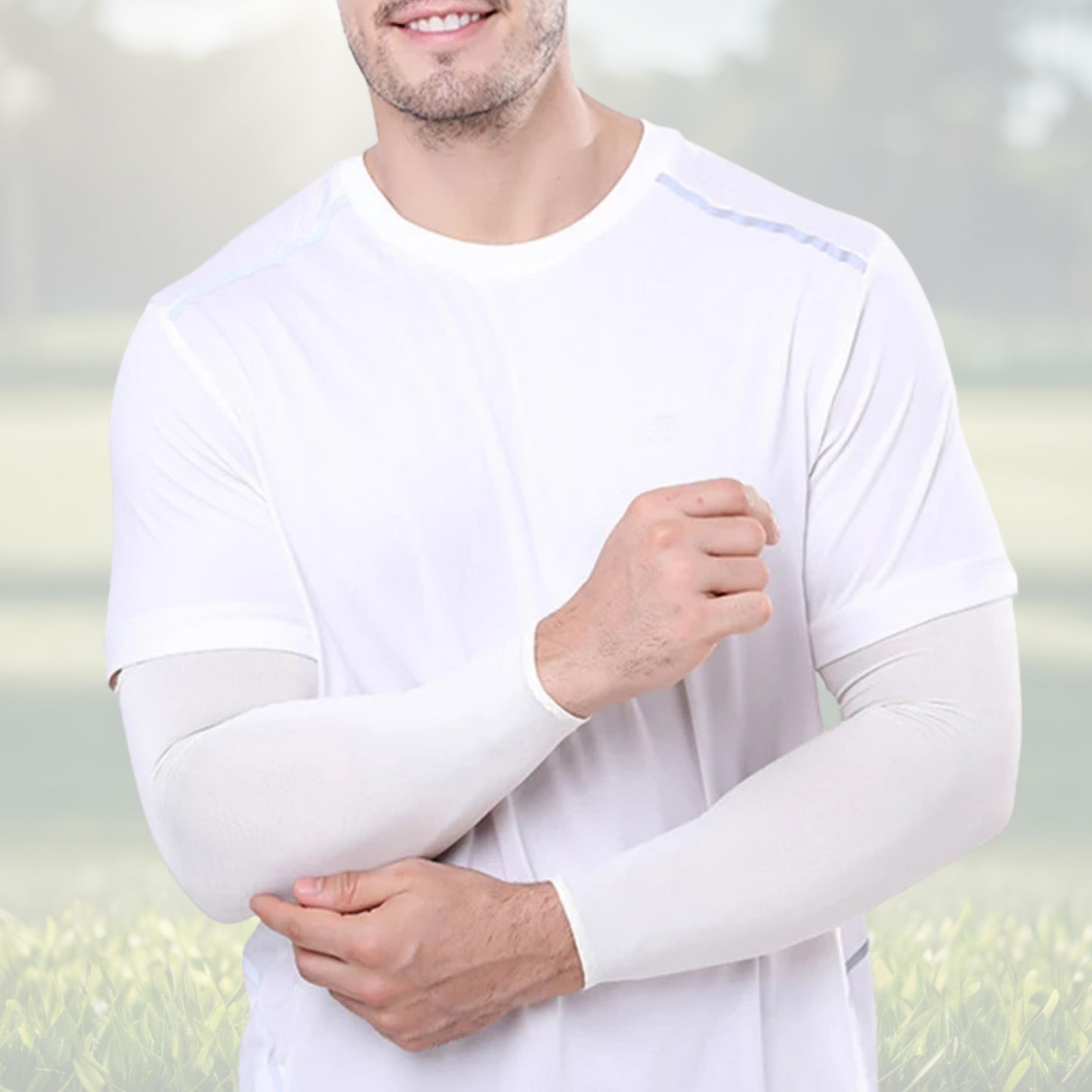A pair of Sportiq Swift Sleeves in Ice Fade White, flexible and stretchy made of breathable polyester with a cooling and sun blocking affect, displayed on a grass background.