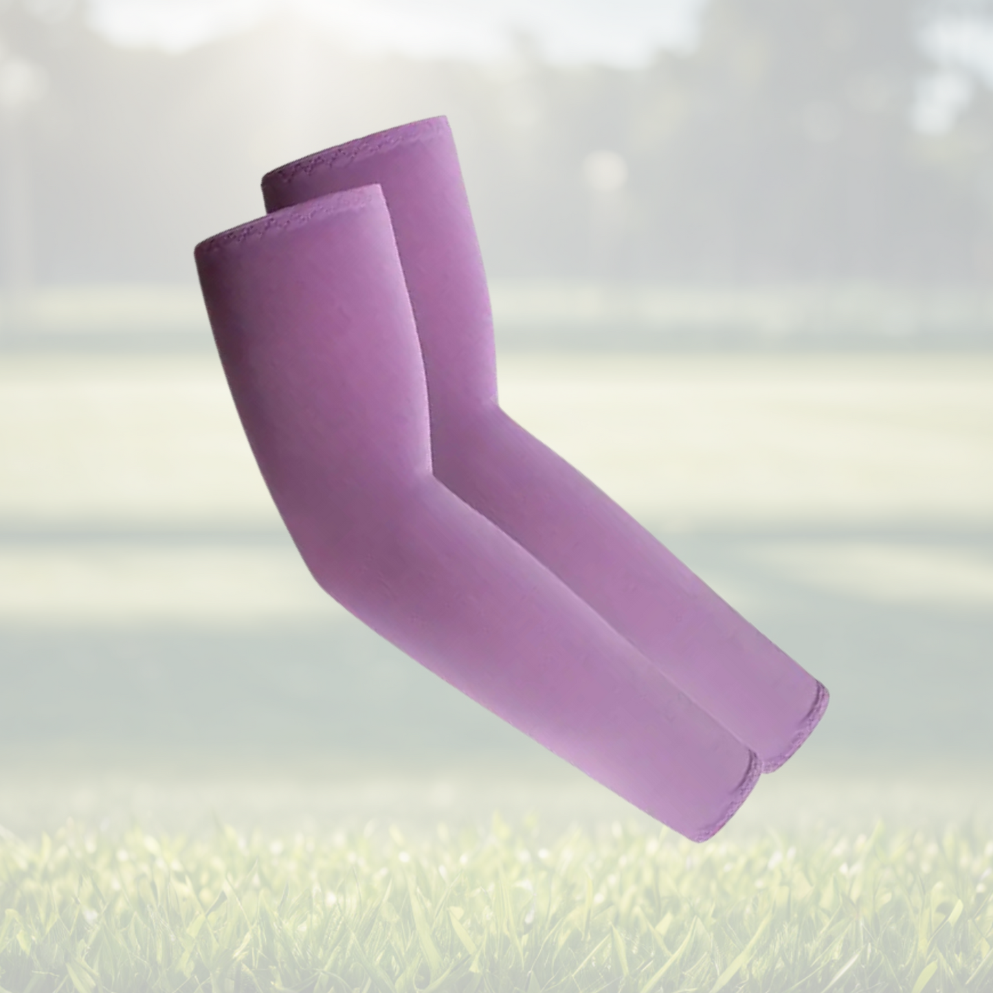 A pair of Sportiq Swift Sleeves in Violet Rush Purple, flexible and stretchy made of breathable polyester with a cooling and sun blocking affect, displayed on a grass background.