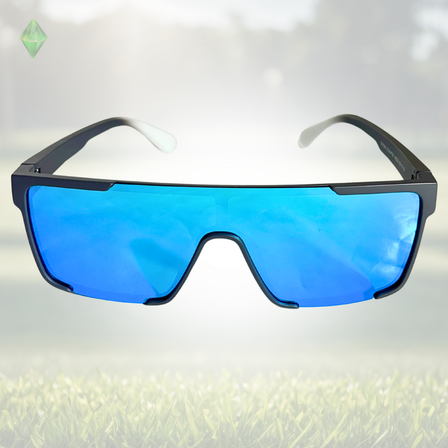 A pair of Sportiq Zen - Blue professional sport sunglasses with blue reflective lenses and black frame, polarized UV400, polycarbonate frame with TAC lens, displayed on a grass background.