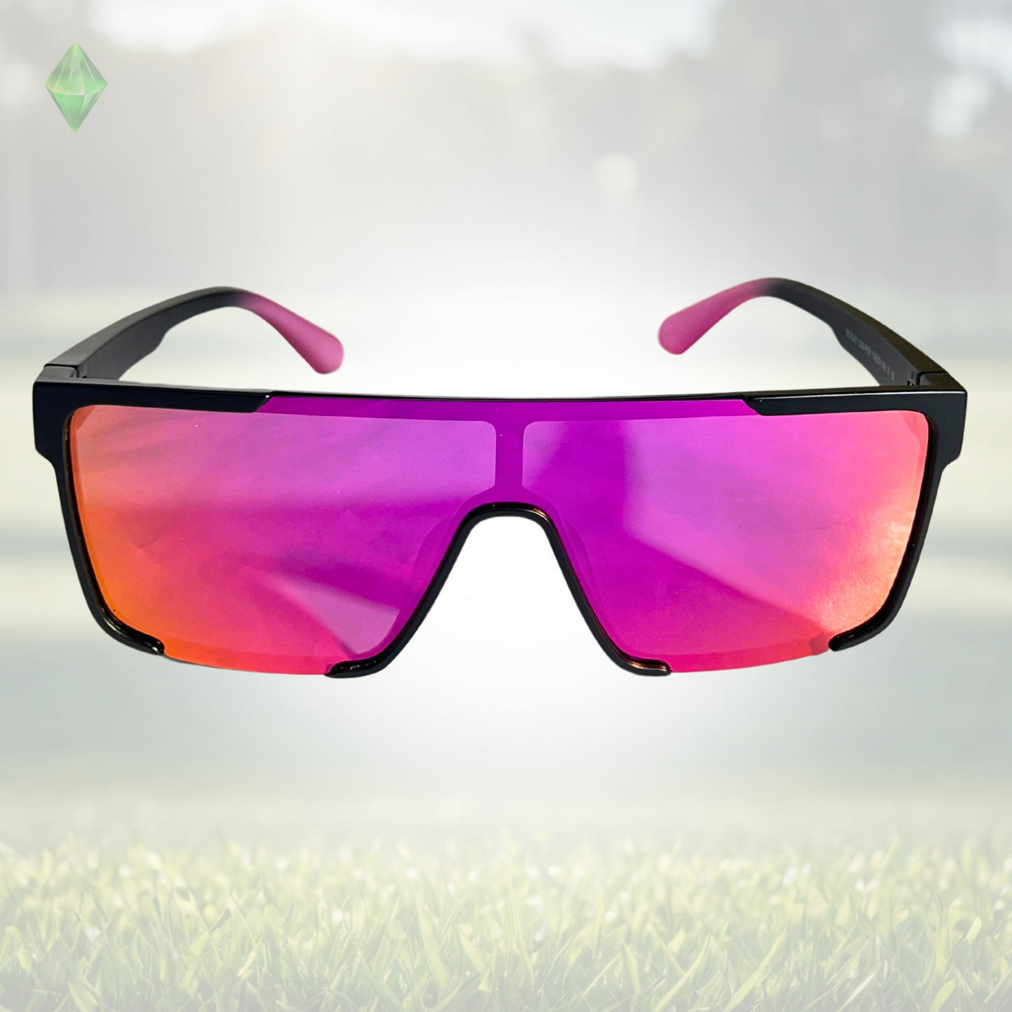 A pair of Sportiq Zen - Pink professional sport sunglasses with pink reflective lenses and black frame, polarized UV400, polycarbonate frame with TAC lens, displayed on a grass background.