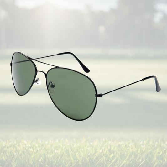 A pair of Sportiq Altitude Nightfall performance sunglasses with black lenses and steel frame, UV400, polycarbonate frame with polycarbonate lens, displayed on a grass background.