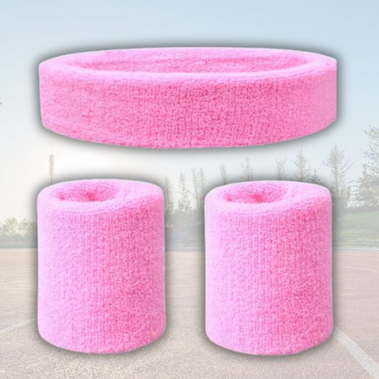 A Sportiq DripFlex Headband Set in Bright Blush Pink, made from a polyester cotton blend with medium to high level elasticity and machine washable (cold), displayed on a grass background.