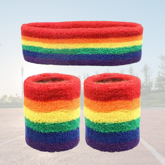 A Sportiq DripFlex Headband Set in Flux Rainbow, made from a polyester cotton blend with medium to high level elasticity and machine washable (cold), displayed on a grass background.