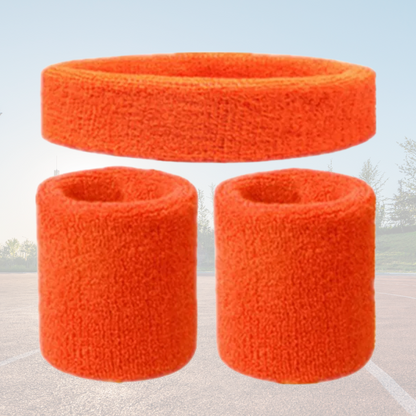 A Sportiq DripFlex Headband Set in Mandarin Orange, made from a polyester cotton blend with medium to high level elasticity and machine washable (cold), displayed on a grass background.