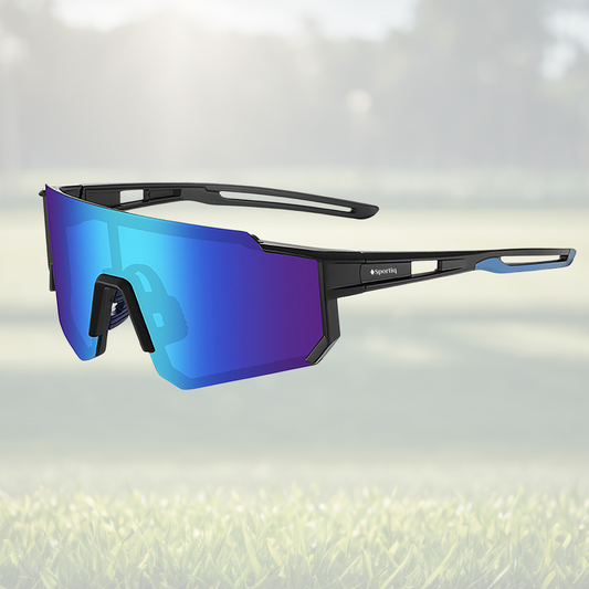 A pair of Sportiq Gamechanger Cobalt professional sport sunglasses with blue reflective lenses and black frame, polarized UV400, polycarbonate frame with TAC lens, displayed on a grass background.