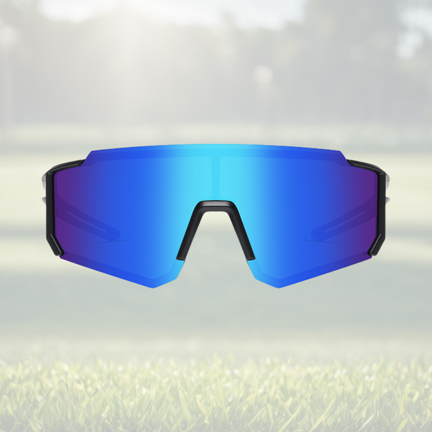 A pair of Sportiq Gamechanger Cobalt professional sport sunglasses with blue reflective lenses and black frame, polarized UV400, polycarbonate frame with TAC lens, displayed on a grass background.