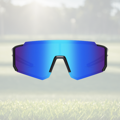 A pair of Sportiq Gamechanger Cobalt professional sport sunglasses with blue reflective lenses and black frame, polarized UV400, polycarbonate frame with TAC lens, displayed on a grass background.