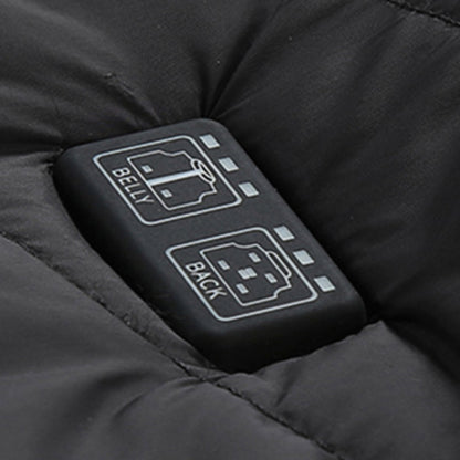 Showcase of a zone control button for a Black Sportiq HeatCore Vest, puffer style and weatherproof, wind resistant with electric heated carbon fibre panels. 