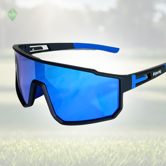 A pair of Sportiq VividShield sunglasses with blue reflective lenses and a black frame,  polarized UV400, polycarbonate frame with TAC lens, displayed on a grass background.