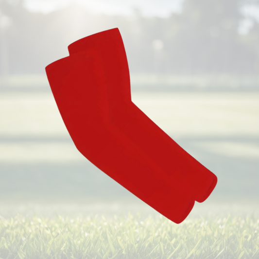 A pair of Sportiq Swift Sleeves in Crimson Drive Red, flexible and stretchy made of breathable polyester with a cooling and sun blocking affect, displayed on a grass background.