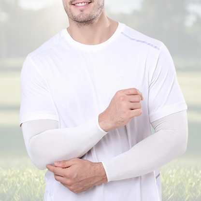A pair of Sportiq Swift Sleeves in Ice Fade White, flexible and stretchy made of breathable polyester with a cooling and sun blocking affect, displayed on a grass background.