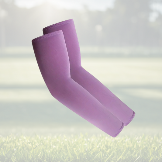 A pair of Sportiq Swift Sleeves in Violet Rush Purple, flexible and stretchy made of breathable polyester with a cooling and sun blocking affect, displayed on a grass background.