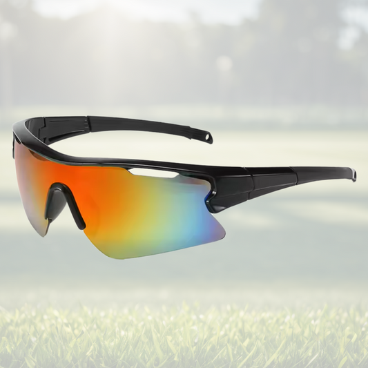 A pair of Sportiq Vector Eclipse performance sunglasses with reflective orange lenses and black frame, UV400, polycarbonate frame with polycarbonate lens, displayed on a grass background.