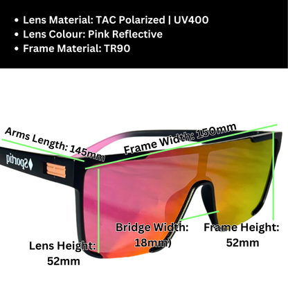 A pair of Sportiq Zen - Pink professional sport sunglasses with pink reflective lenses and black frame, polarized UV400, polycarbonate frame with TAC lens, displayed on a grass background.
